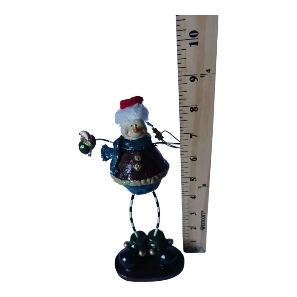 Santa Claus figurine with wire hands and legs